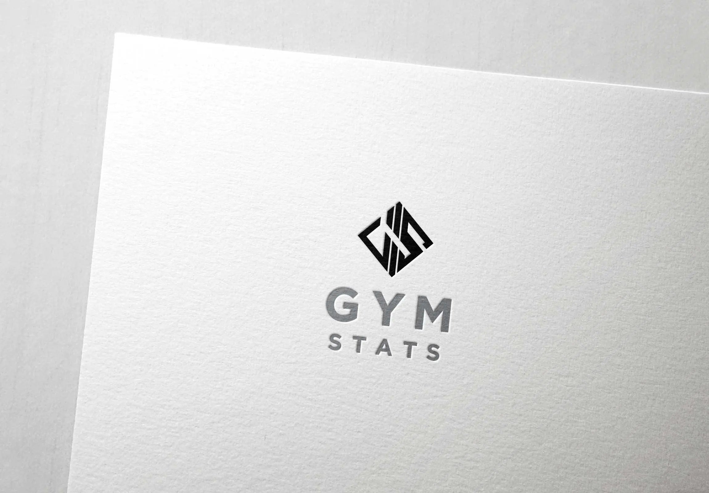 Gym stats logotype mockup on a paper.